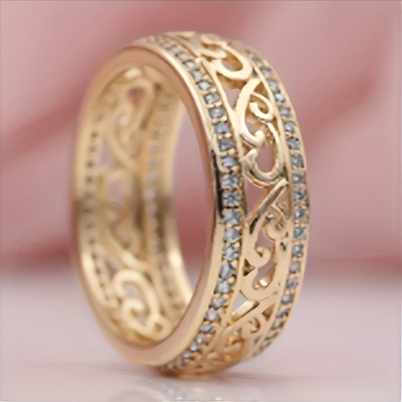 A Women'S Hollow Patterned Ring with Faux Diamonds, a Stylish And Unique Piece of Jewelry for Women