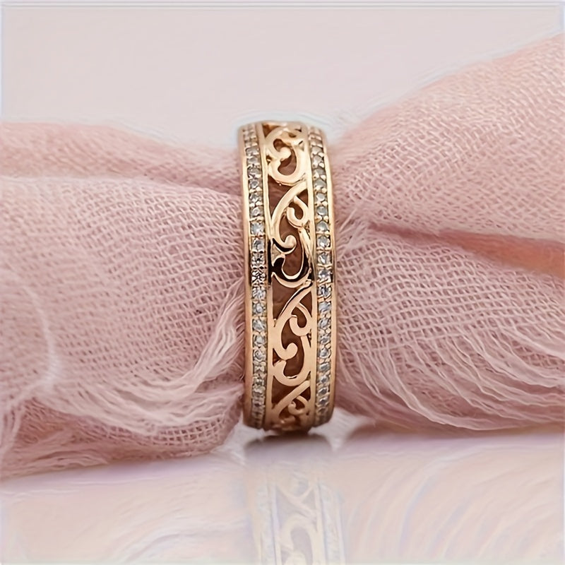 A Women'S Hollow Patterned Ring with Faux Diamonds, a Stylish And Unique Piece of Jewelry for Women