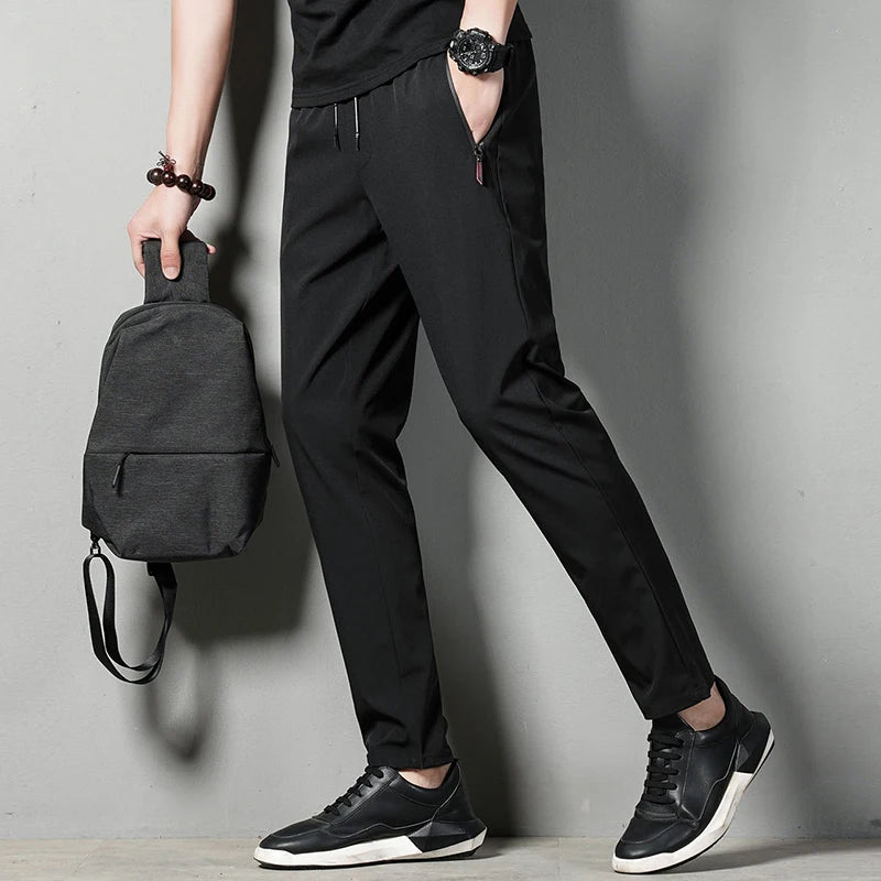men's casual pants slim fit thin Korean version ice silk pants Jinlun sports pants straight tube quick drying pants