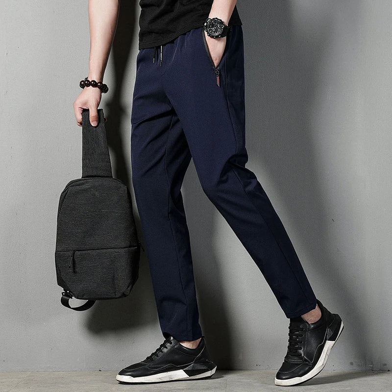 men's casual pants slim fit thin Korean version ice silk pants Jinlun sports pants straight tube quick drying pants